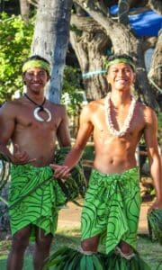 Hawaiian men wearing traditional outfits at Diamond Head Luau