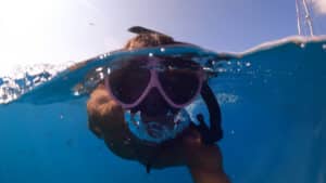 Boy snorkeling under water