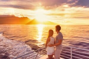 couple on a cruise watching the sunset